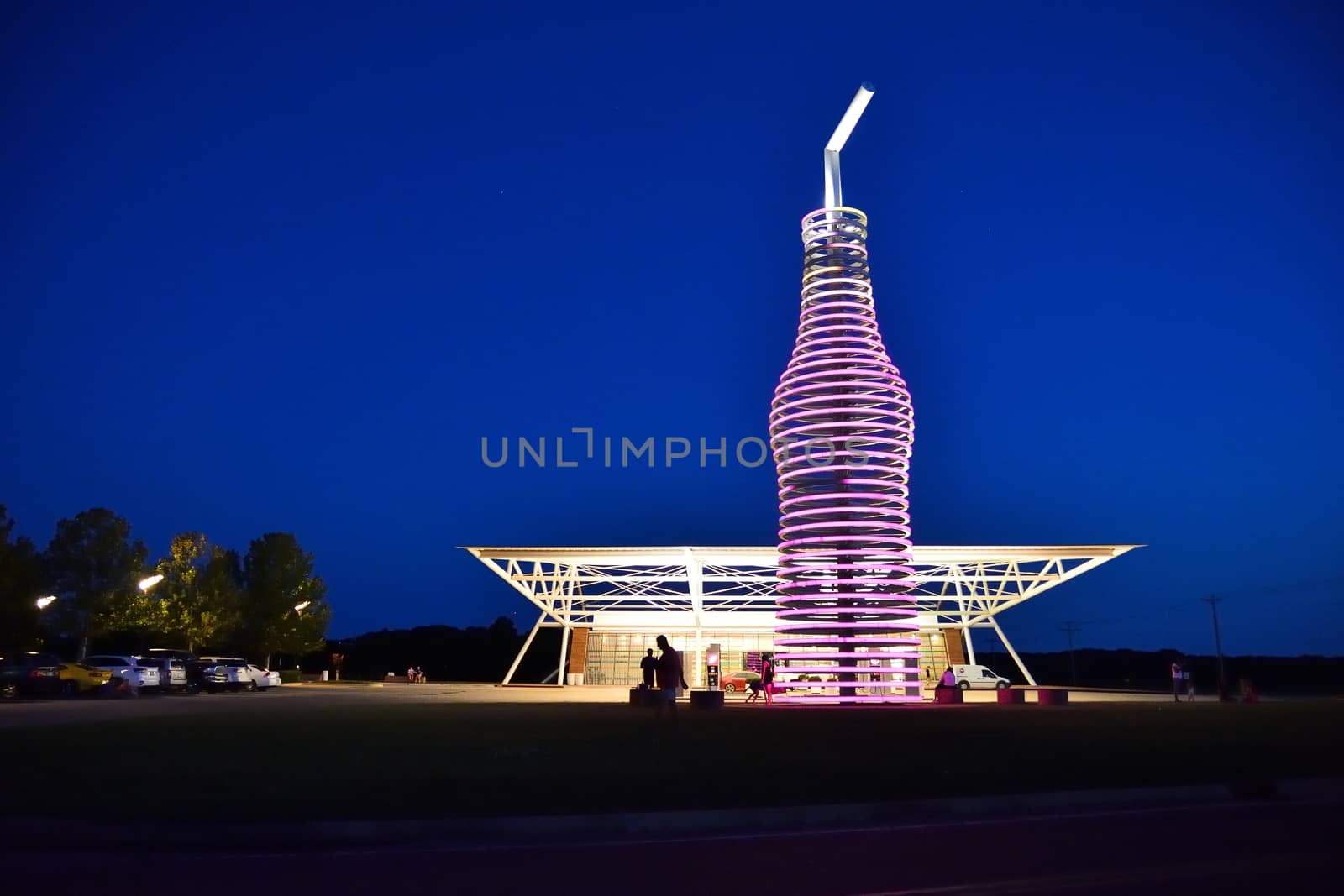 Arcadia, Oklahoma - July 19, 2017: Drive down historic route 66 through Arcadia, Oklahoma, and you canÕt miss the neon, 66-foot-tall soda bottle in front of POPS. The biggest bottle of soda in the world