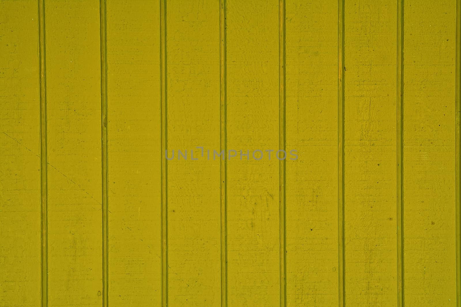 Close-up of vertical wooden planks of yellow color