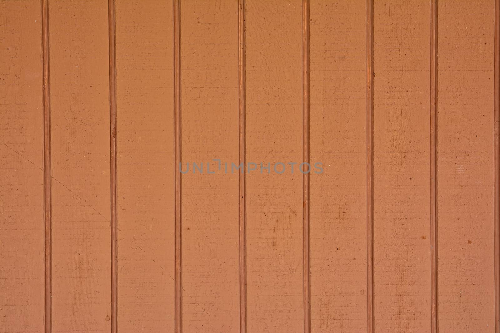 Close-up of vertical wooden planks of brown color