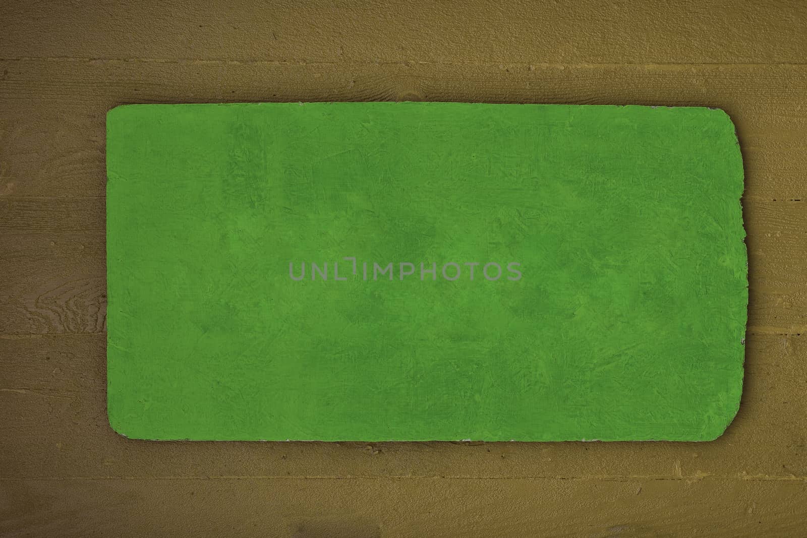 A rustic wooden sign in green and brown, color copy space.