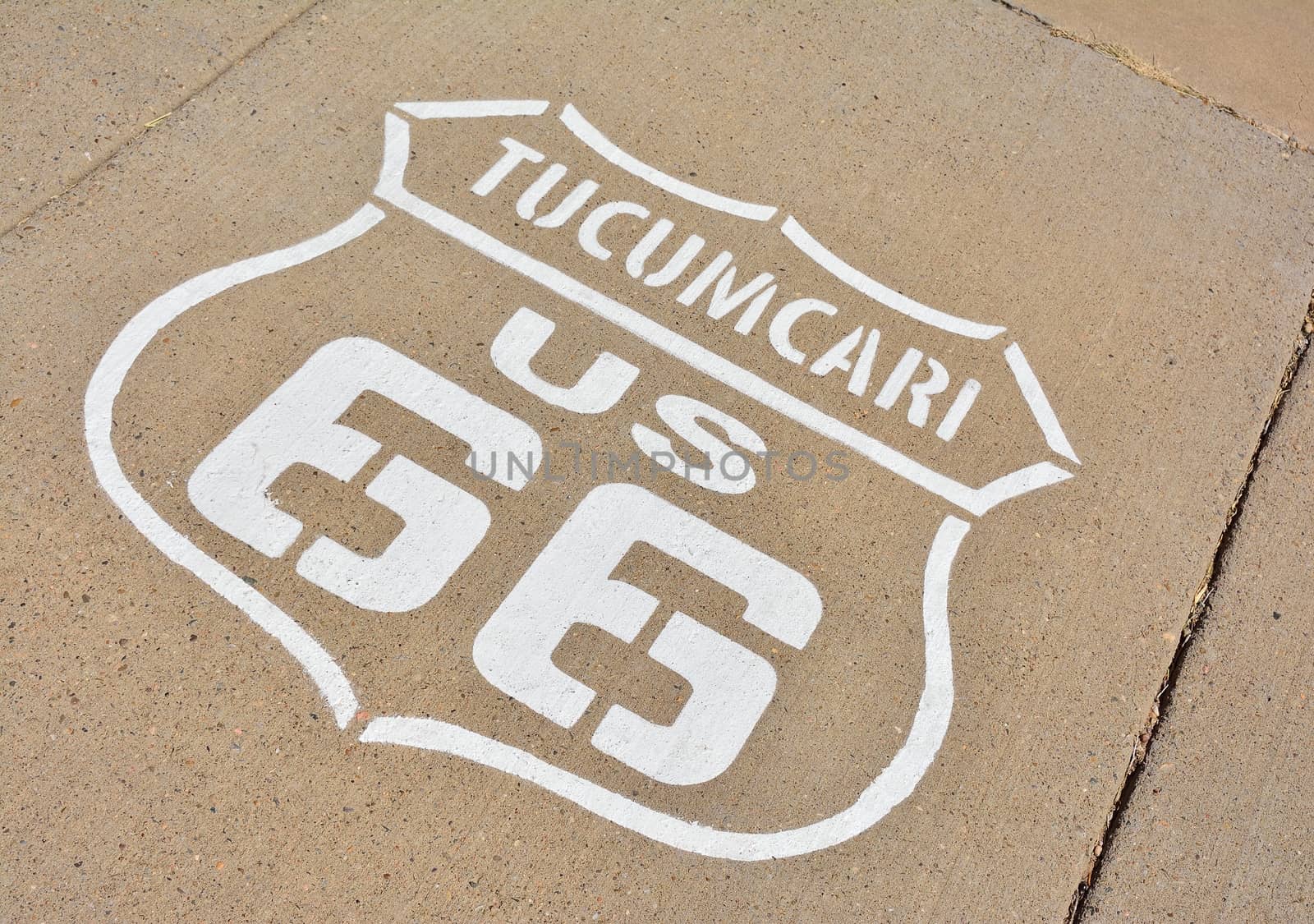 Route 66 sign painted on the road in Tucumcari