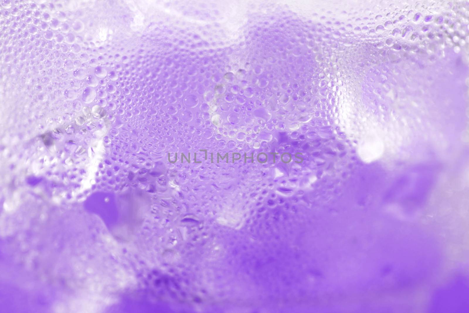 water drop soda ice baking background fresh cool ice purple texture, selective focus by cgdeaw