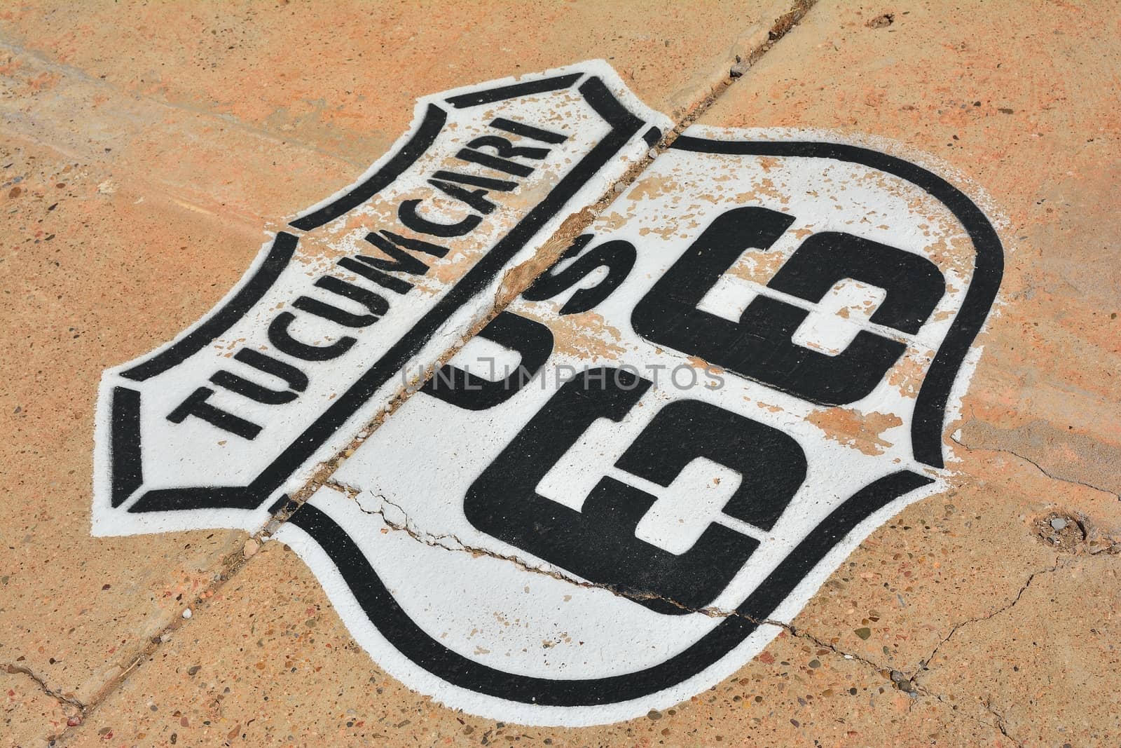 Route 66 sign painted on the road in Tucumcari