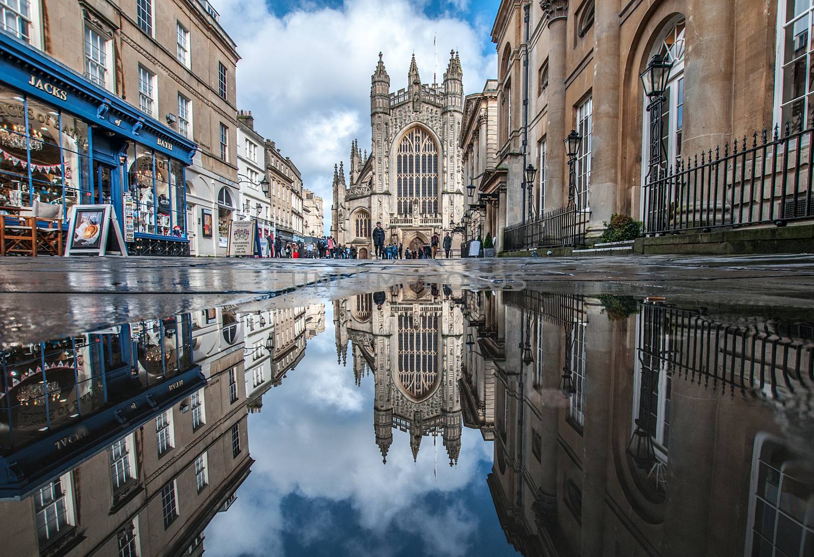 looking through the puddles at bath abbey in england
