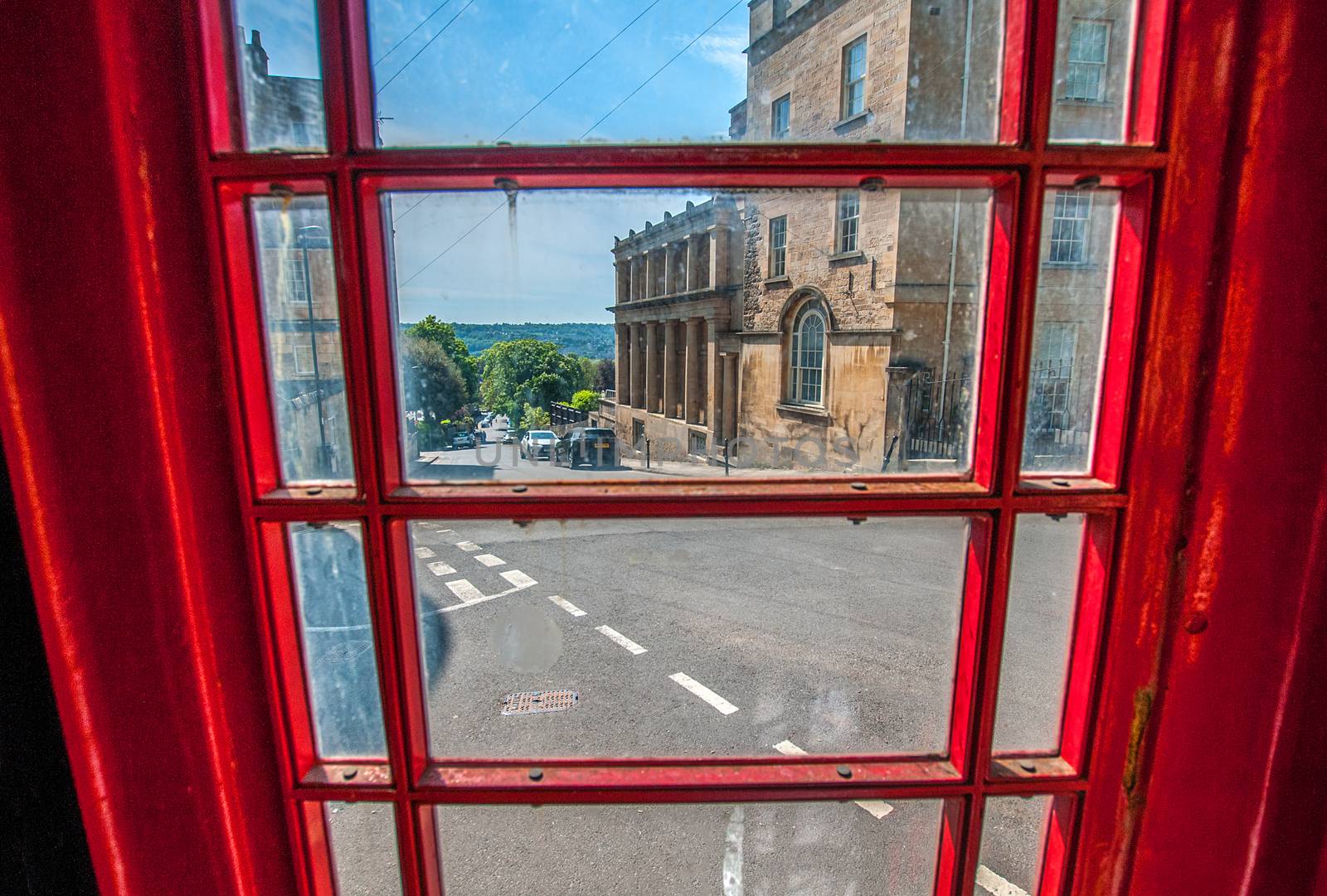 looking out from inside of a red phone box in the sion hill area of bath england by sirspread