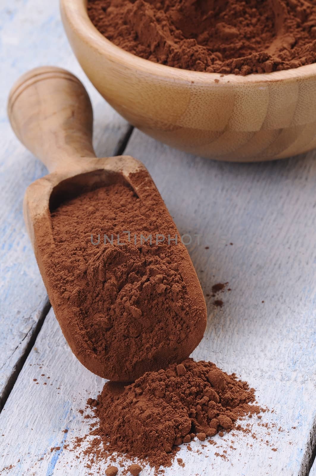 Wooden spoon of cocoa by CreativePhotoSpain