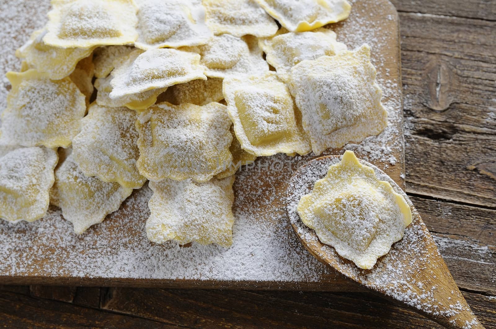 Preparing fresh ravioli at the kitchen table.