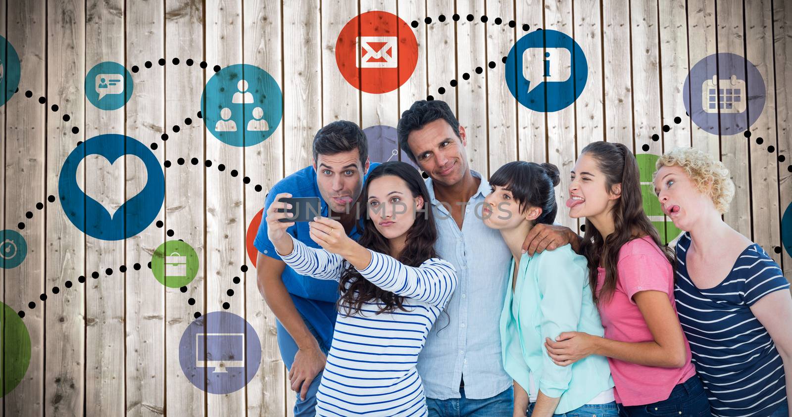 Creative business team taking a selfie against wooden planks background