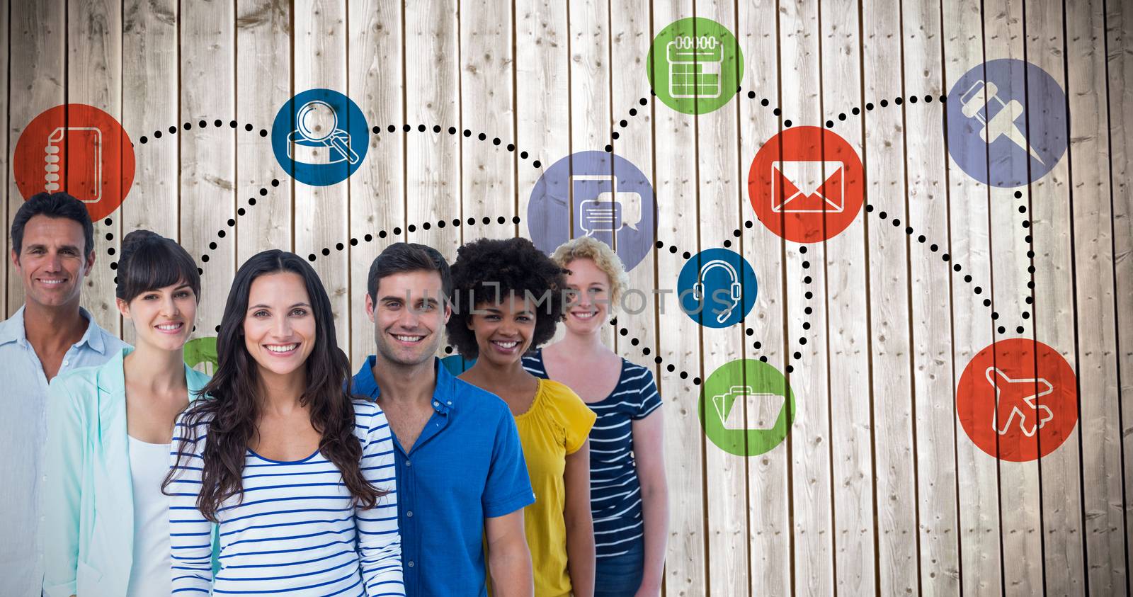 Portrait of creative team against wooden planks background