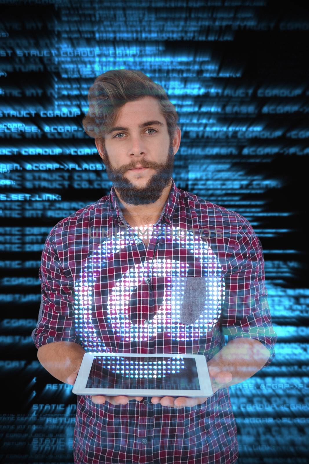 Portrait of hipster holding digital tablet against shiny blue coding on black background