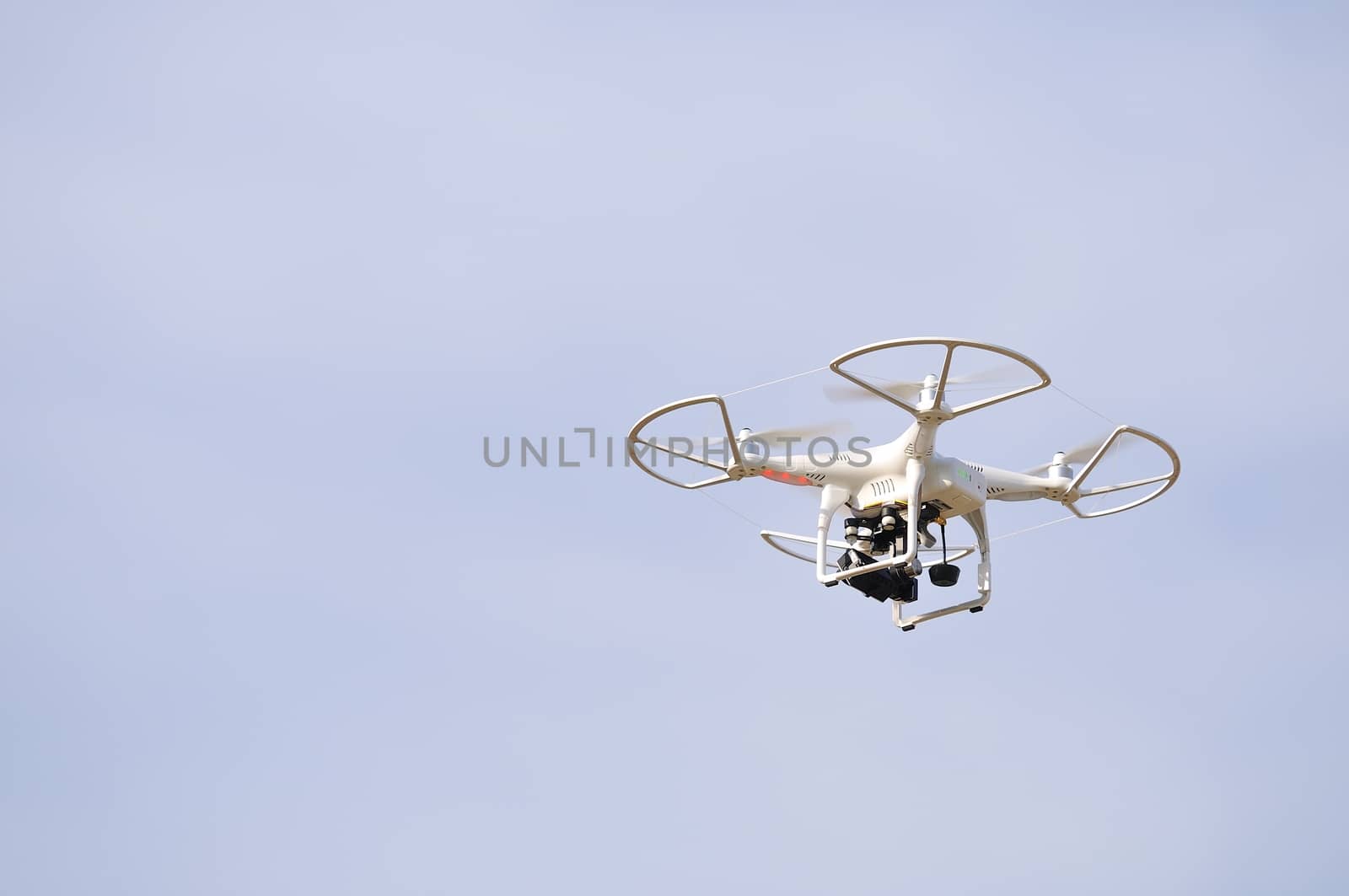 Flying drone in the sky. Flying with an drone for video and photo productions.