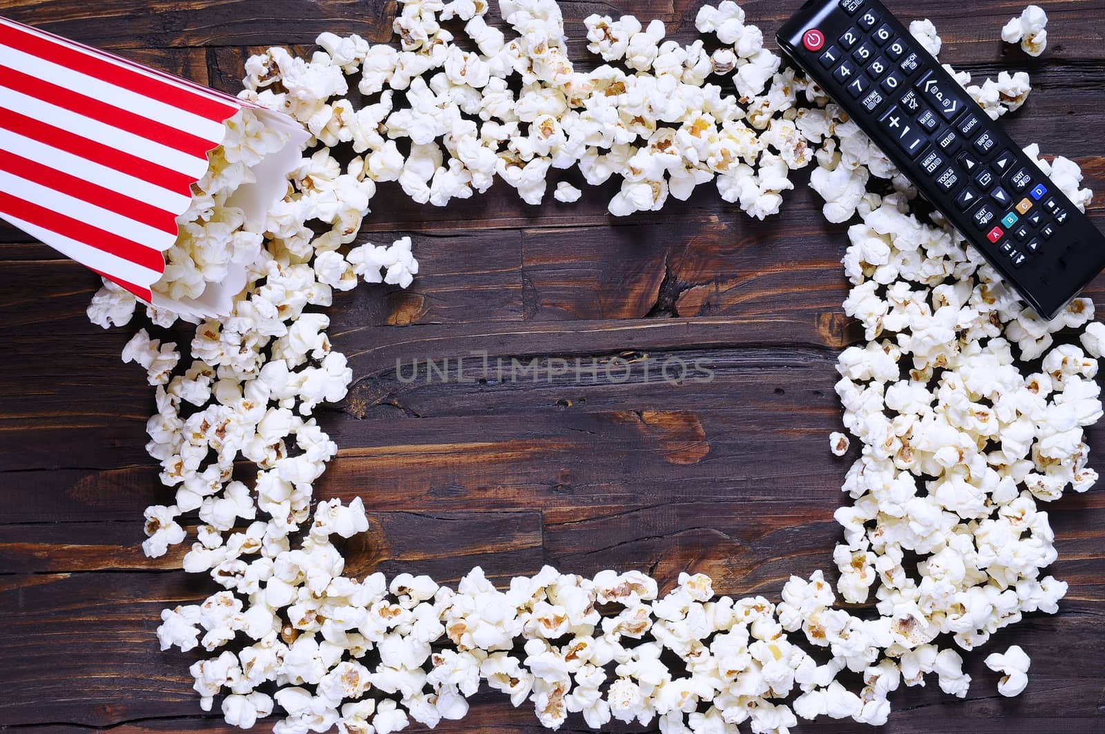 Freshly made popcorn on a wooden table