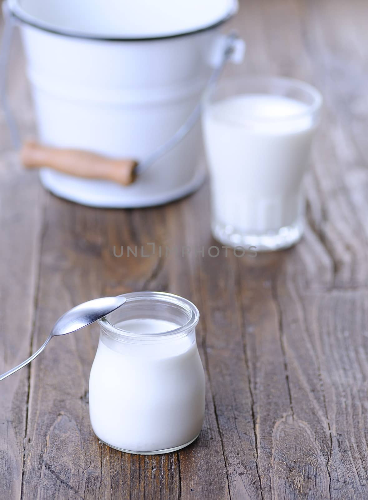 Homemade yogurt on wooden table in the kitchen