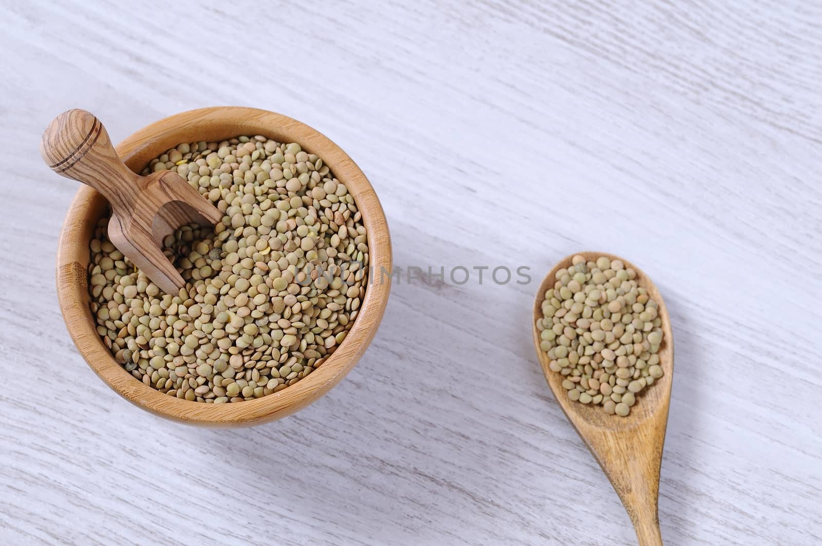 Lentils on wooden table in the kitchen