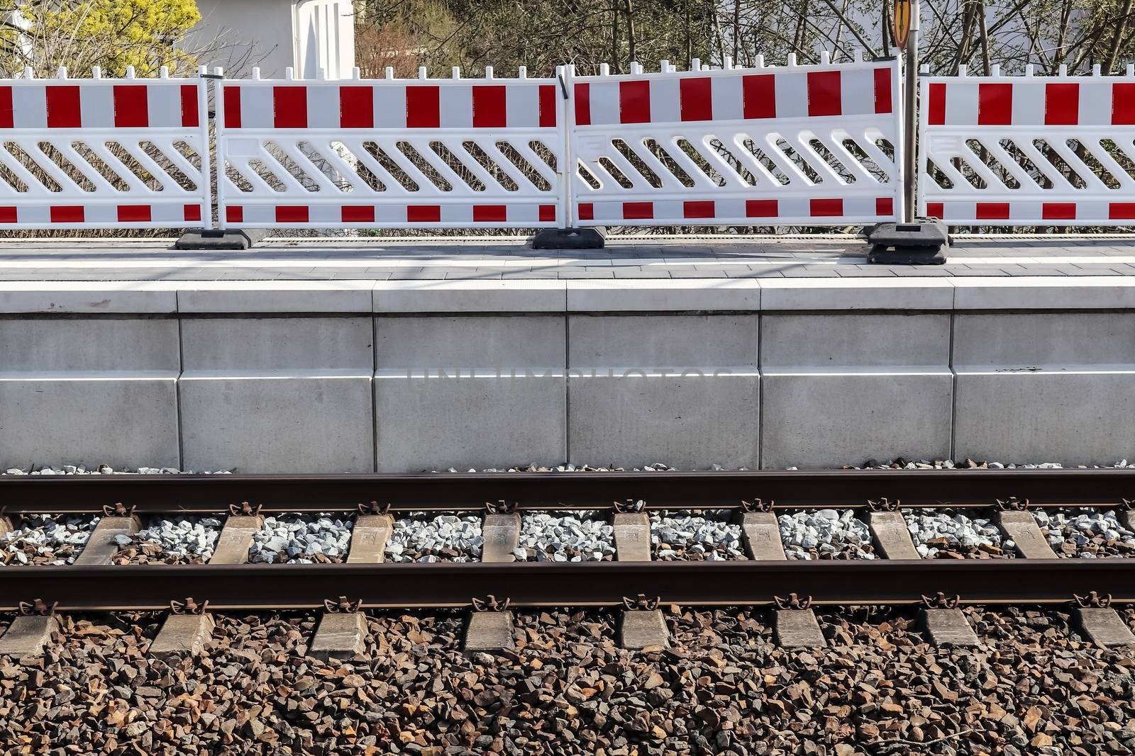 Multiple railroad tracks with junctions at a railway station in  by MP_foto71