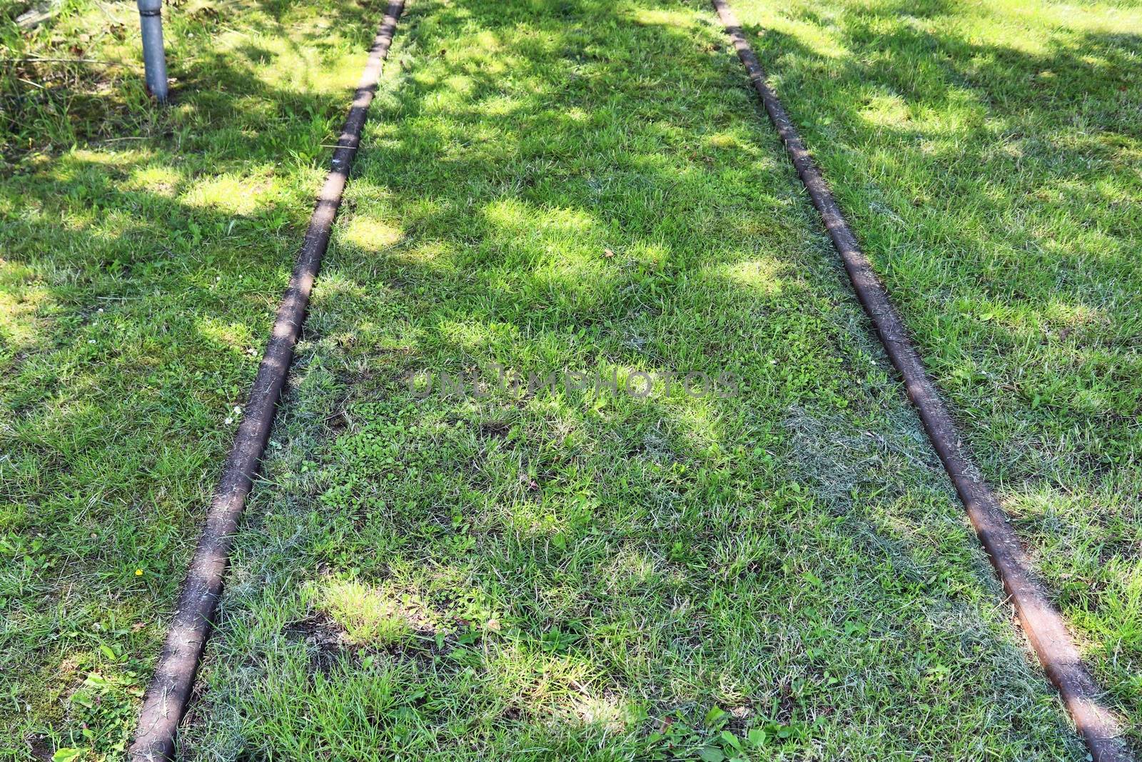 Multiple railroad tracks with junctions at a railway station in  by MP_foto71