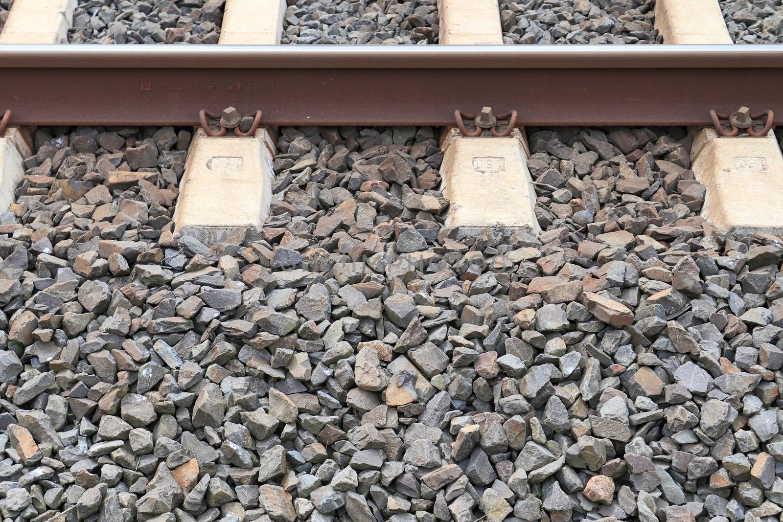 Multiple railroad tracks with junctions at a railway station in  by MP_foto71