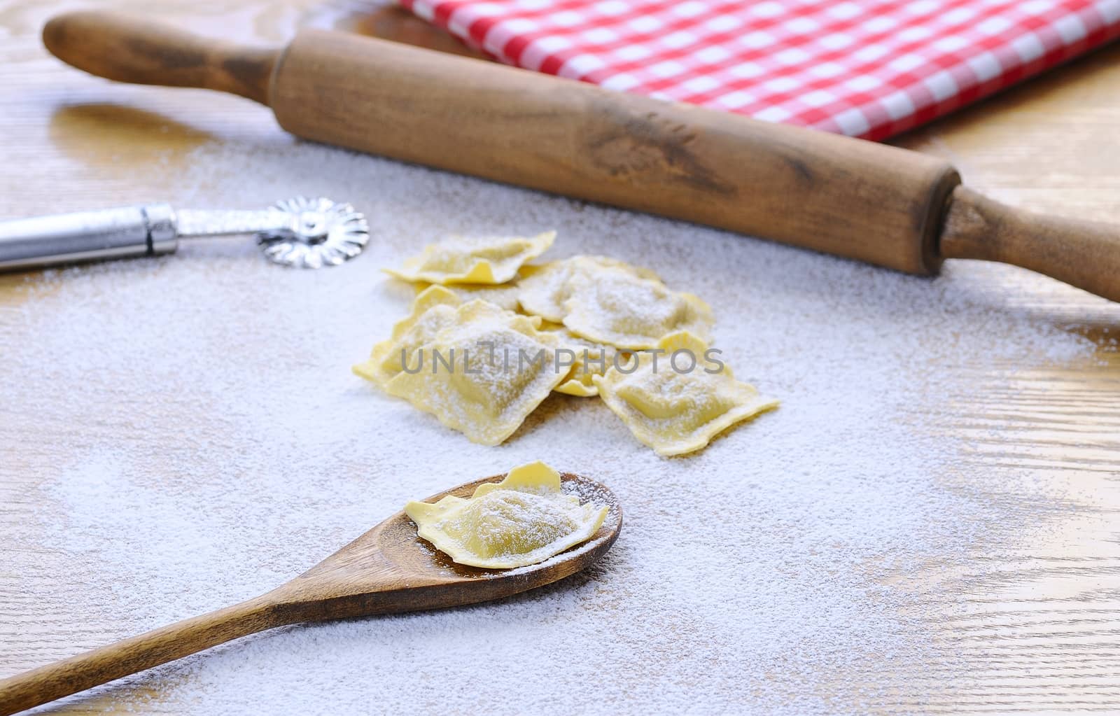 Preparing fresh ravioli at the kitchen table.