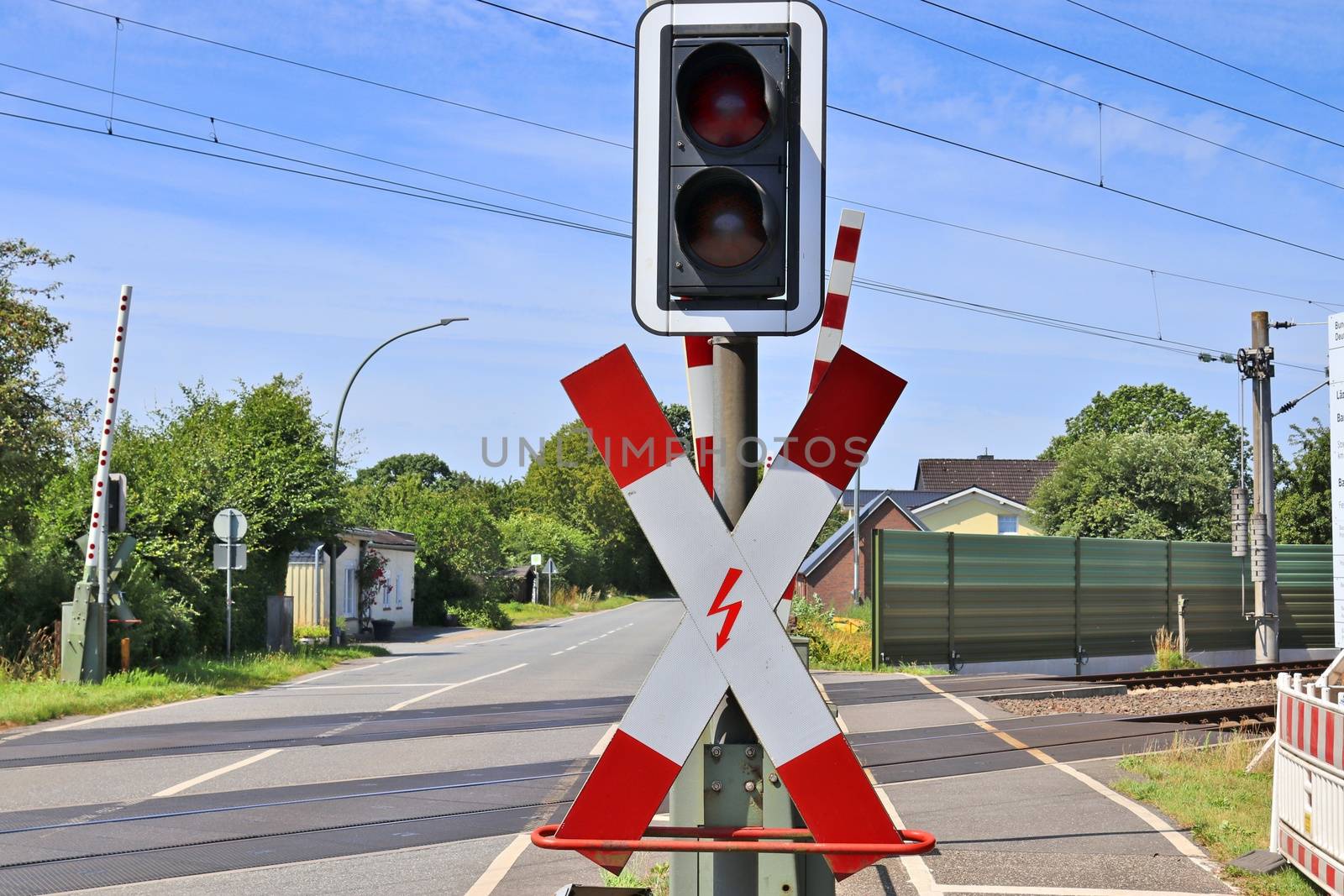 Multiple railroad tracks with junctions at a railway station in  by MP_foto71