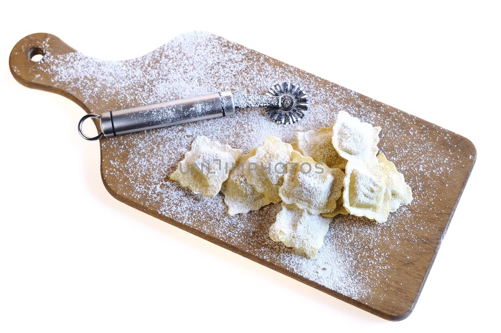Isolated fresh ravioli at the kitchen table.