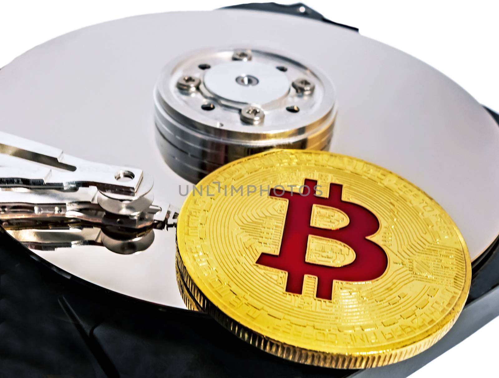 Physical Coin Cryptocurrency BTC Gold Plated Bitcoin in laptop hard disk server wallet. Crypto currency blockchain Coin virtual money concept isolated on white background.