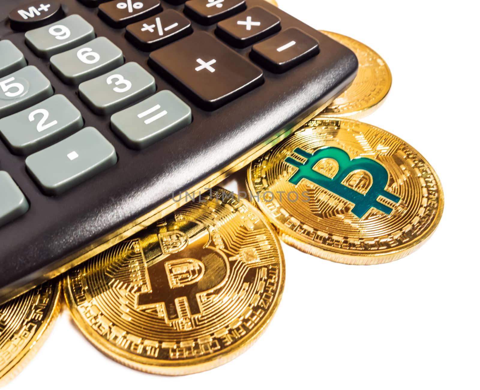 Black electronic calculator Gold bitcoin coin Business concept isolated on white background.