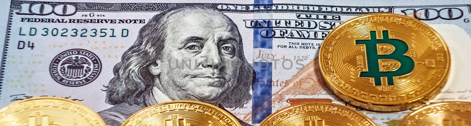 Gold bitcoin coin one hundred dollars bills. by Vladyslav