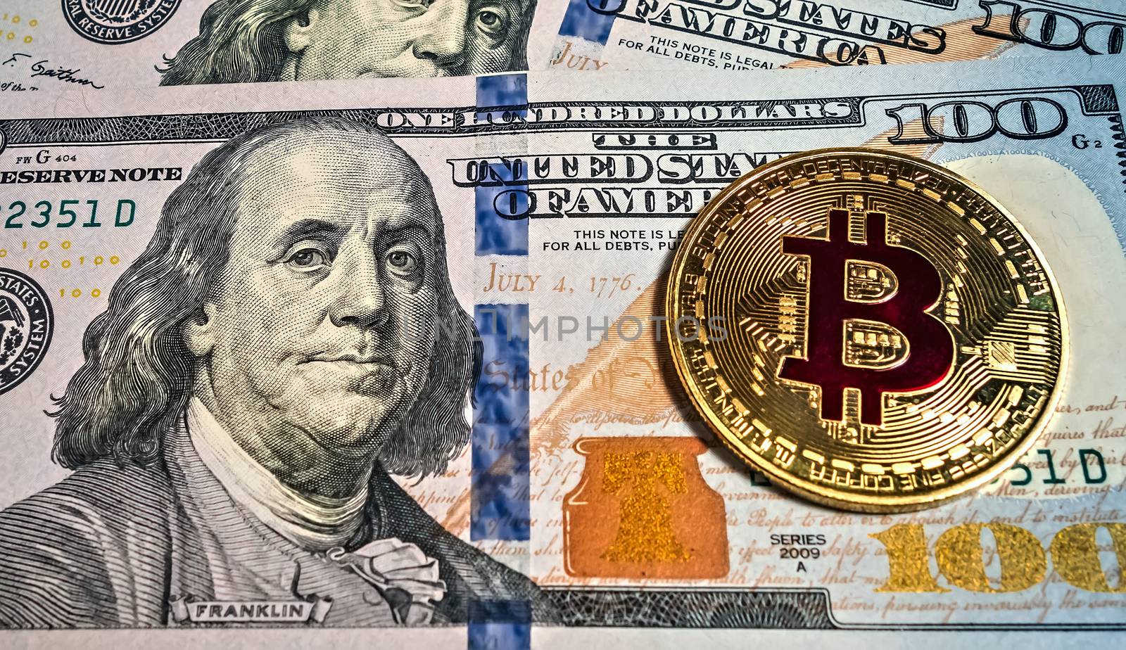 Gold bitcoin coin Macro portrait of Benjamin Franklin of dollar bills background cryptocurrency mining concept.