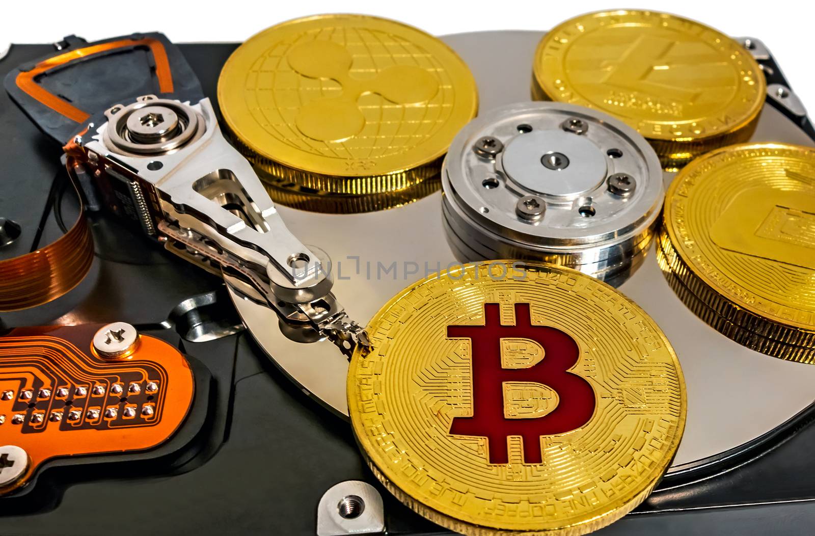 Physical Coin Cryptocurrency BTC Gold Plated Bitcoin in laptop hard disk server. Crypto currency blockchain Coin virtual money concept isolated on white background.