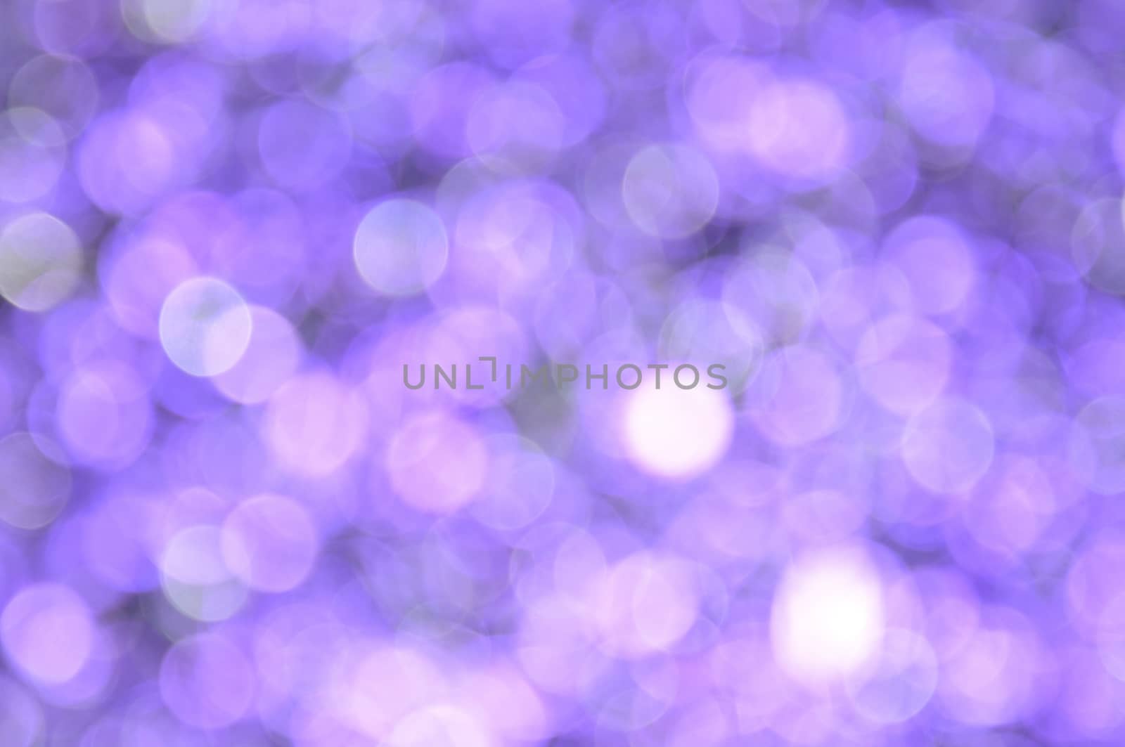 Lilac,Purple colored abstract background with bokeh by moviephoto