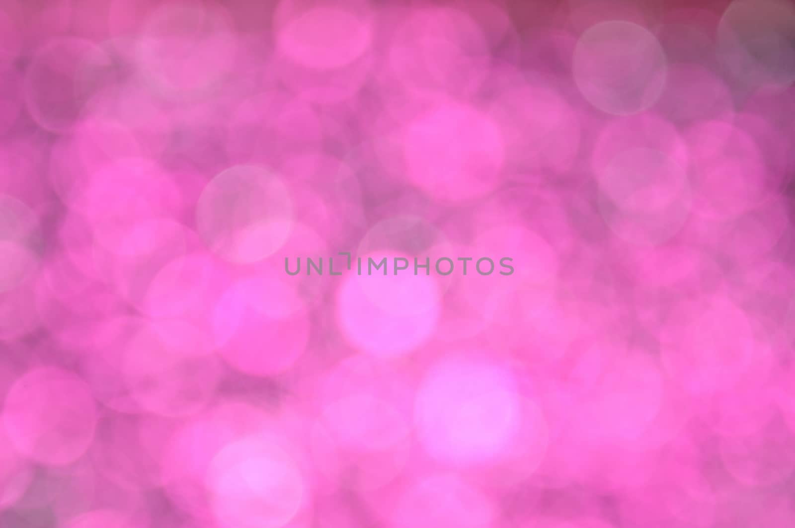 Magenta,Red colored abstract background with bokeh by moviephoto