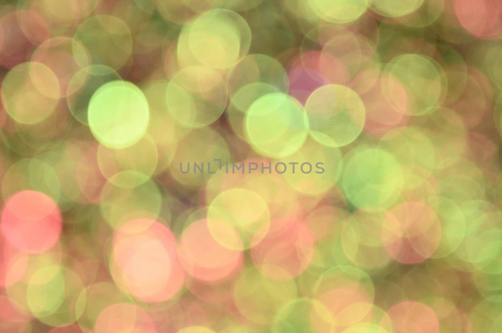 Green,red,orange,yellow colored abstract background with bokeh, for the new year and christmas