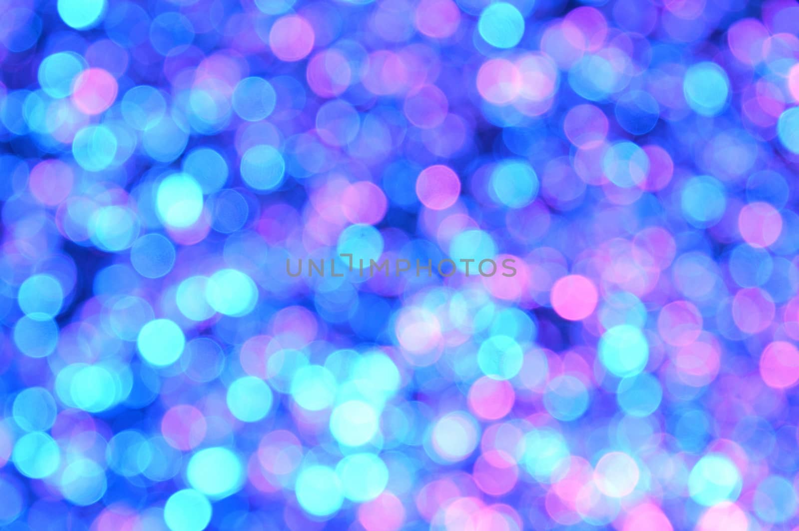 Magenta,Red,Blue,Cyan colored abstract background with bokeh by moviephoto