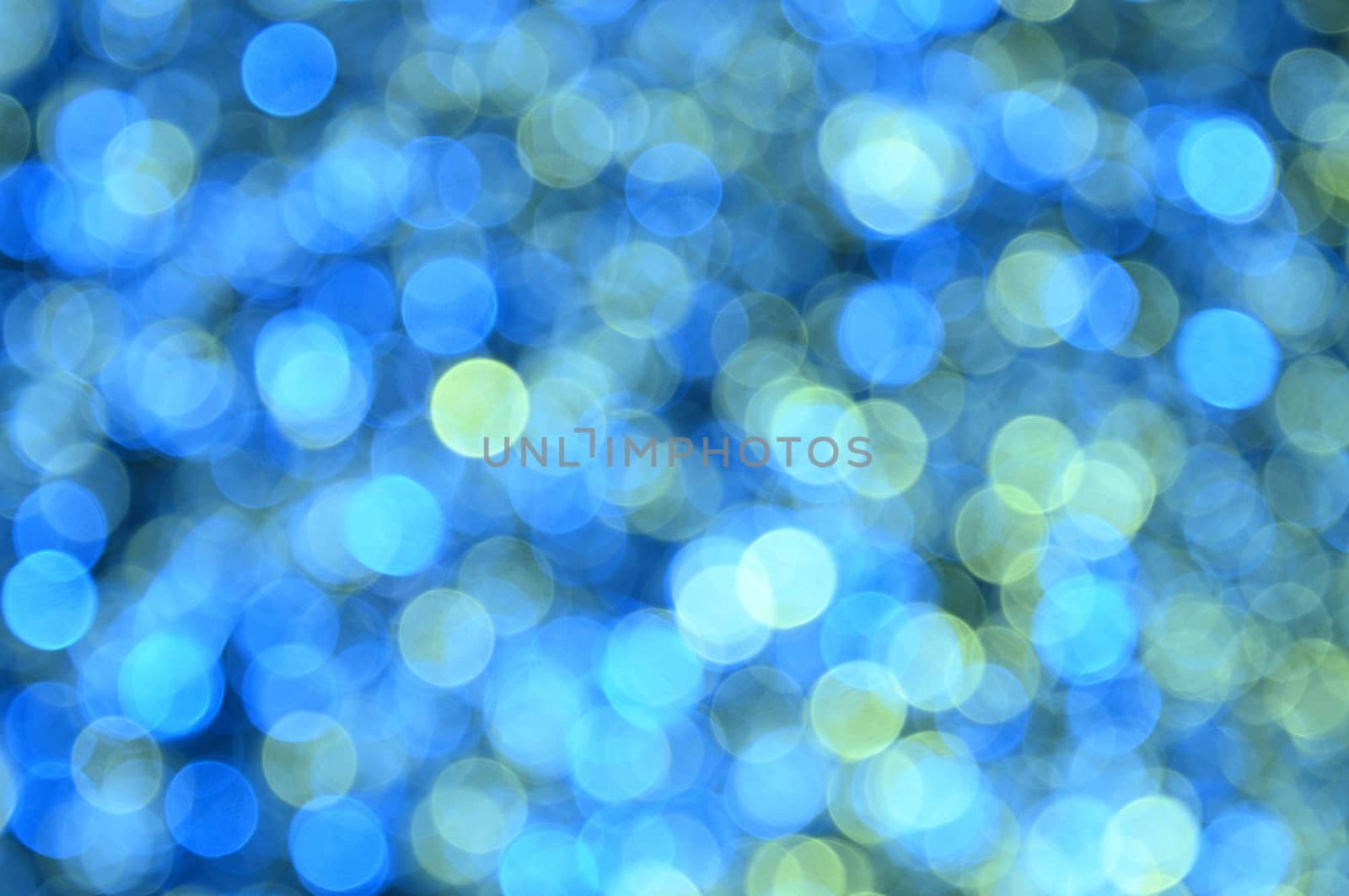 Blue,yellow,cyan,green colored abstract background with bokeh by moviephoto