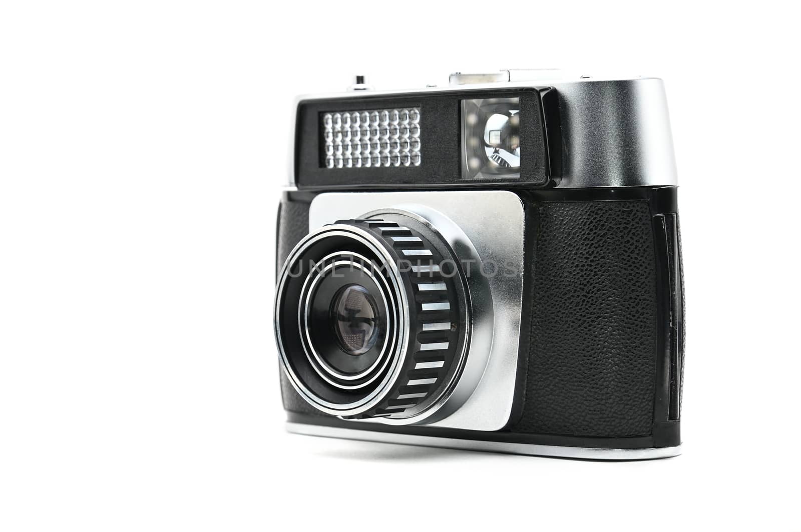 Old camera on isolated background.Photocamera by moviephoto