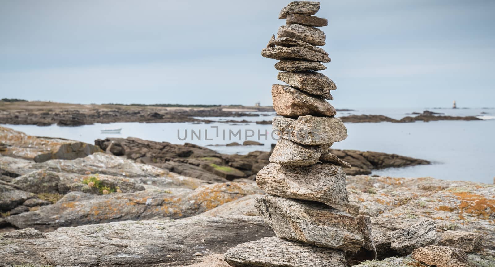 cairn on a hiking trail on the island of Yeu, France
