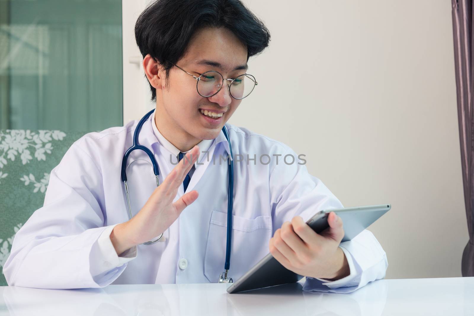 Doctor man smile raise hands to greet patients modern smart digi by Sorapop