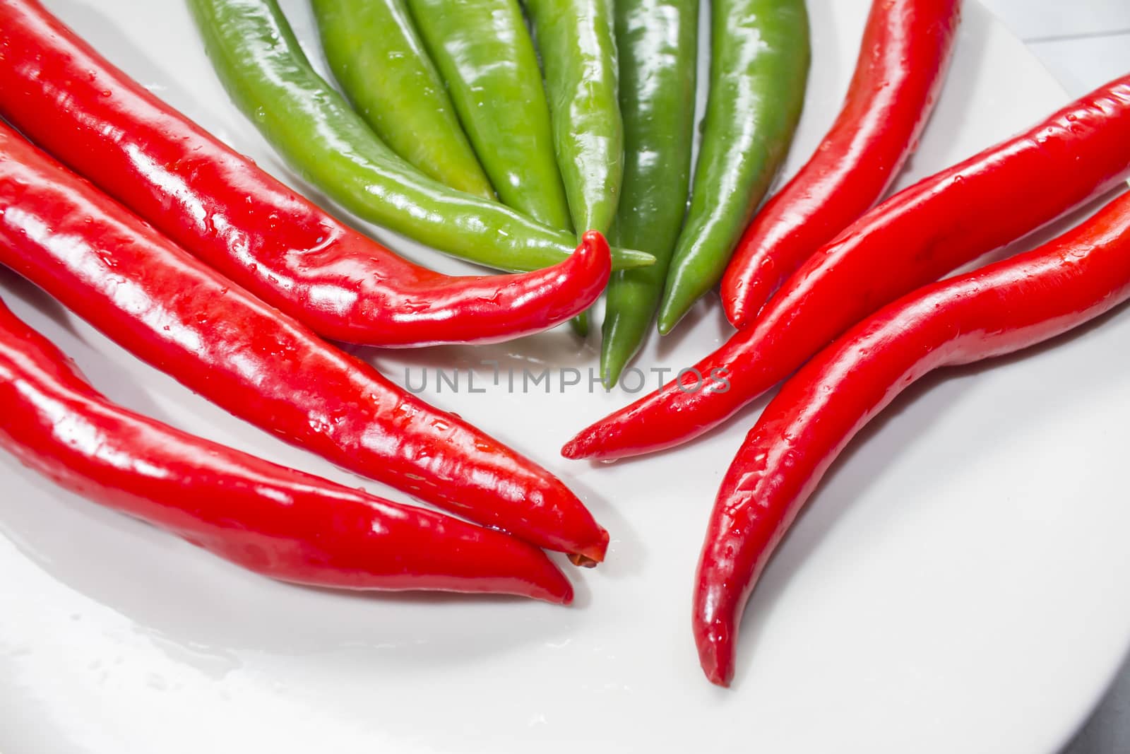 Close up red and green chilli by Gobba17