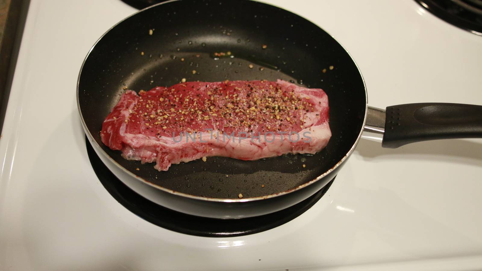 Raw meat Steak with ingredients and pan. Raw fresh meat Steak Striploin with ingredients and frying pan