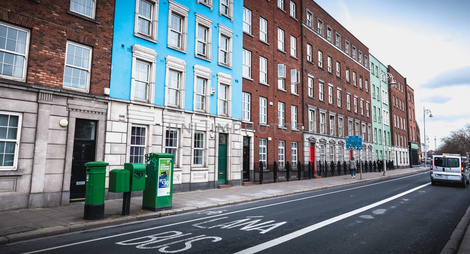 Dublin, Ireland - February 11, 2019: on the road a bus lane in the city center on a winter day