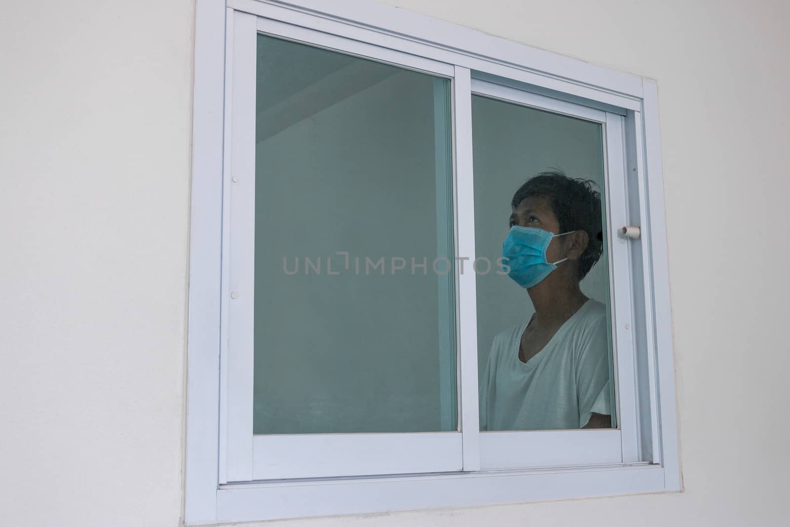 Man in isolation at home for coronavirus outbreak (COVID-19), Quarantine to prevent the spread of the coronavirus (COVID-19)