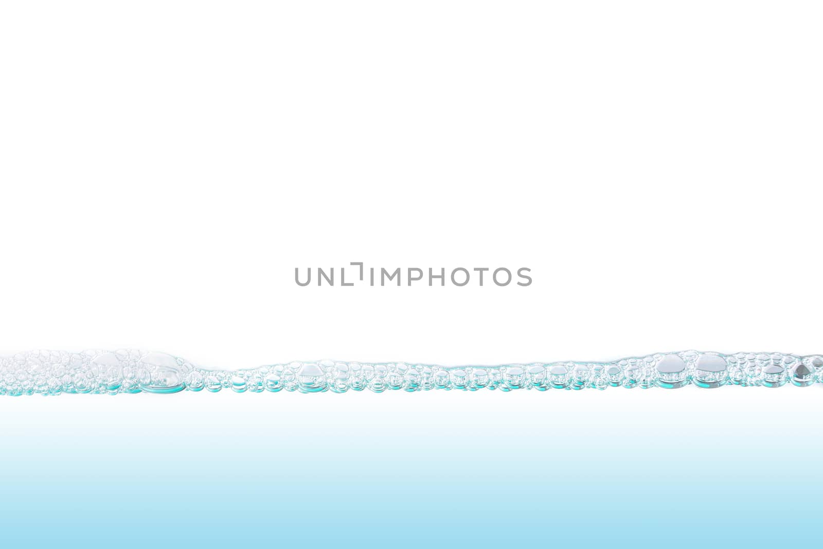 Water with bubbles of air, green and blue clean fresh white background 