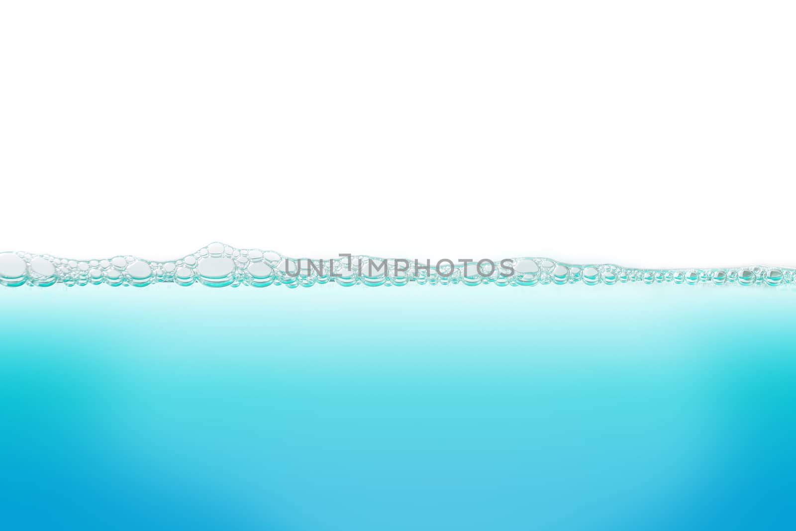 Water with bubbles of air, green and blue clean fresh white background 