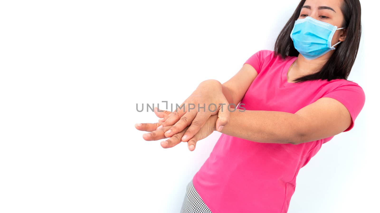 Women washing hands with alcohol gel prevent the spread of the coronavirus (COVID-19)