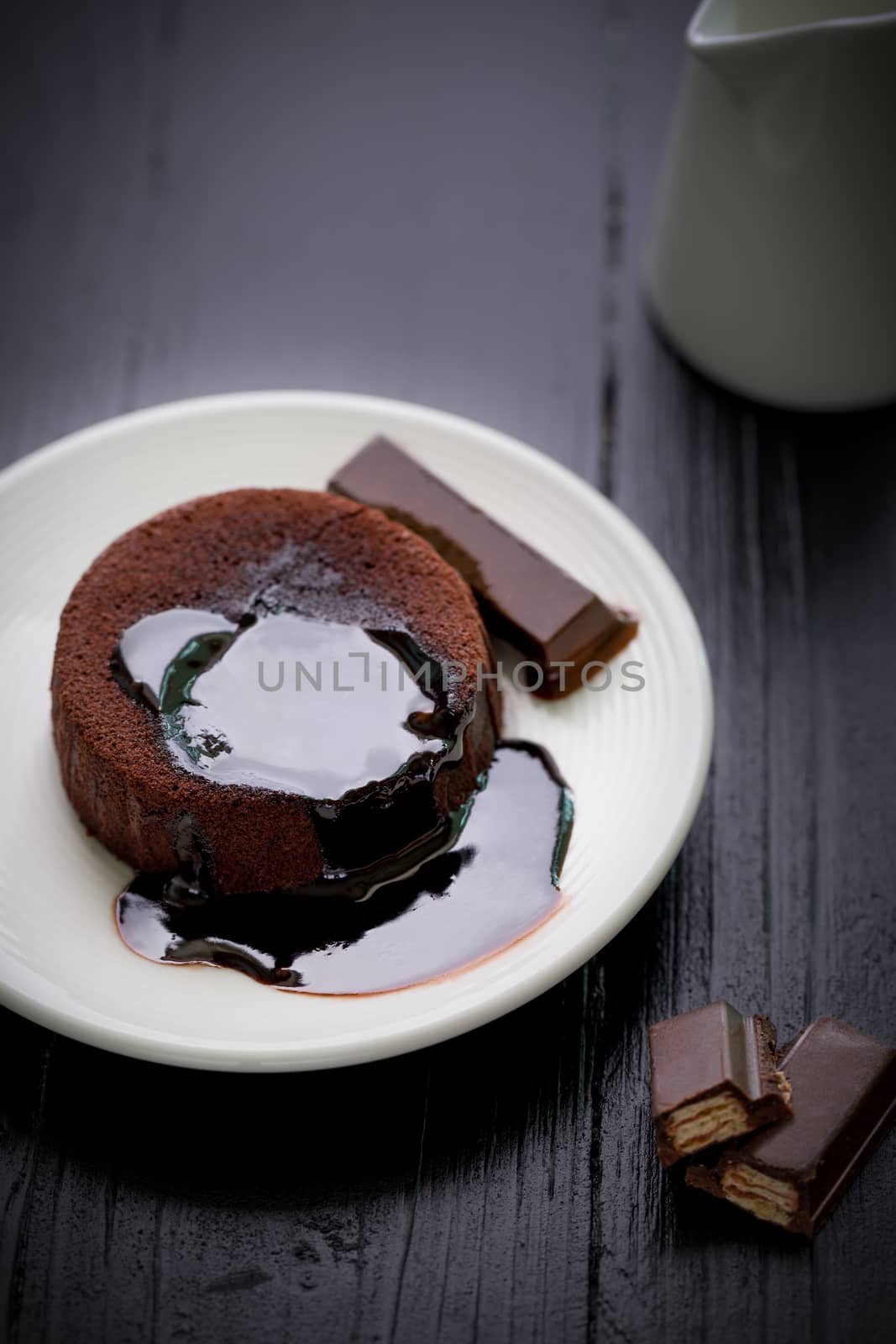 Chocolate lava cake with melting chocolate sauce.