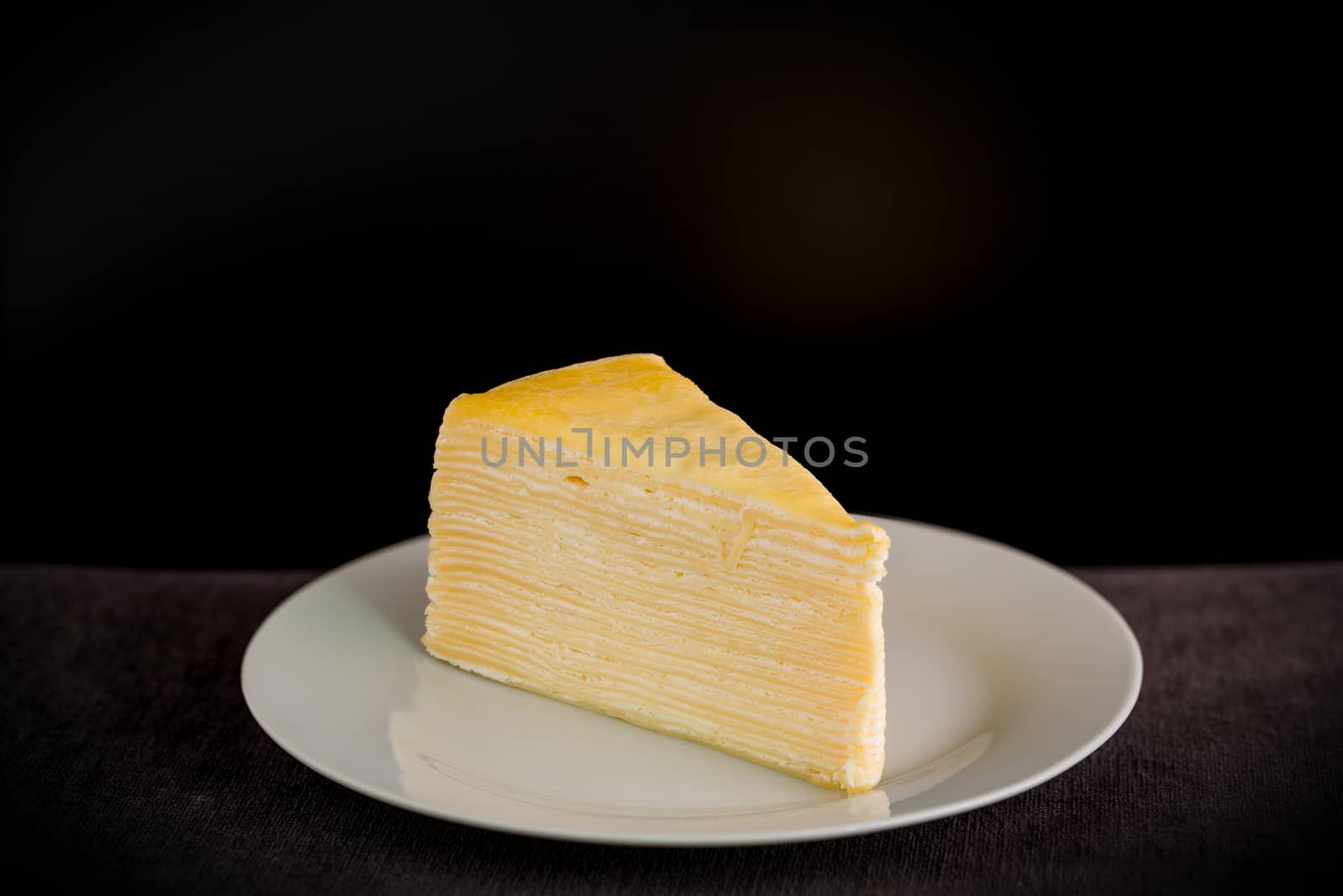 Slice of cake as snack for tea or coffee break.