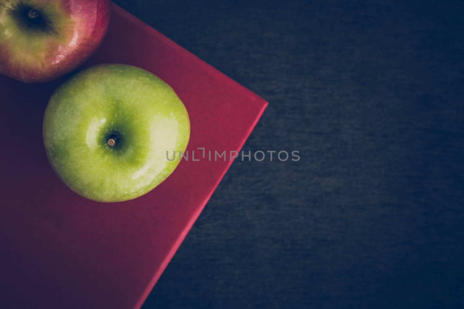 Green apple with book illustrated knowledge and wisdom concept.