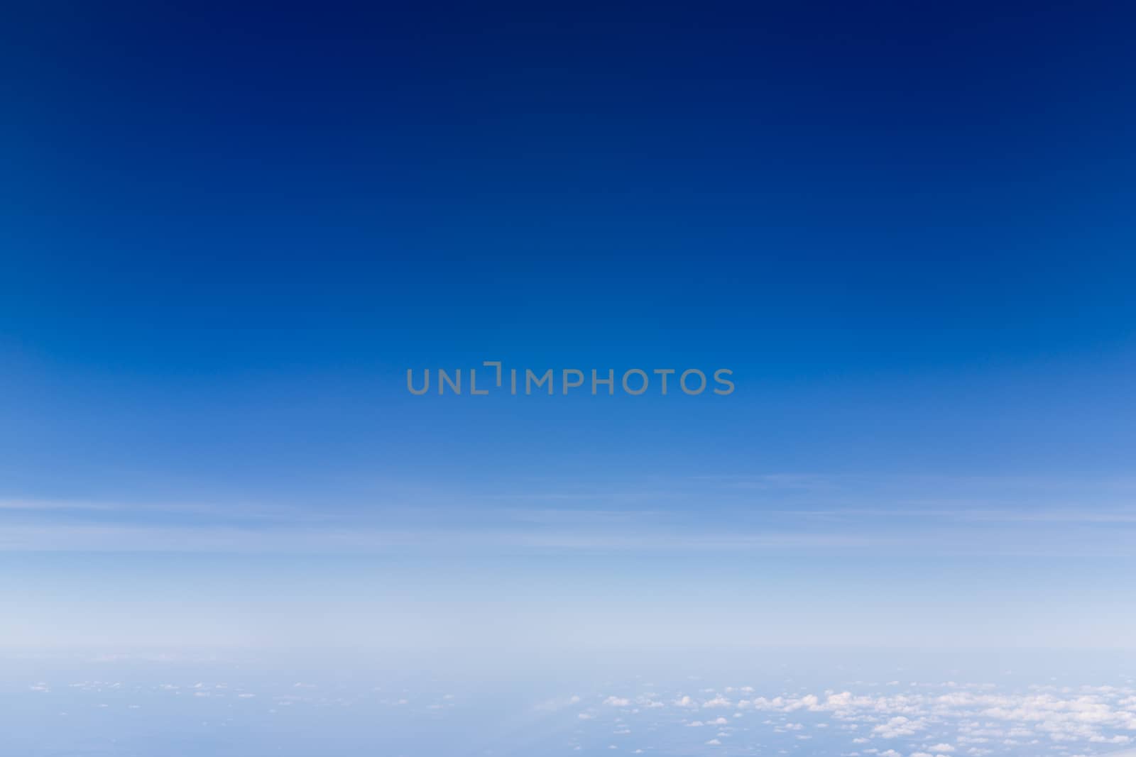 Clear blue sky scene with gradient background.