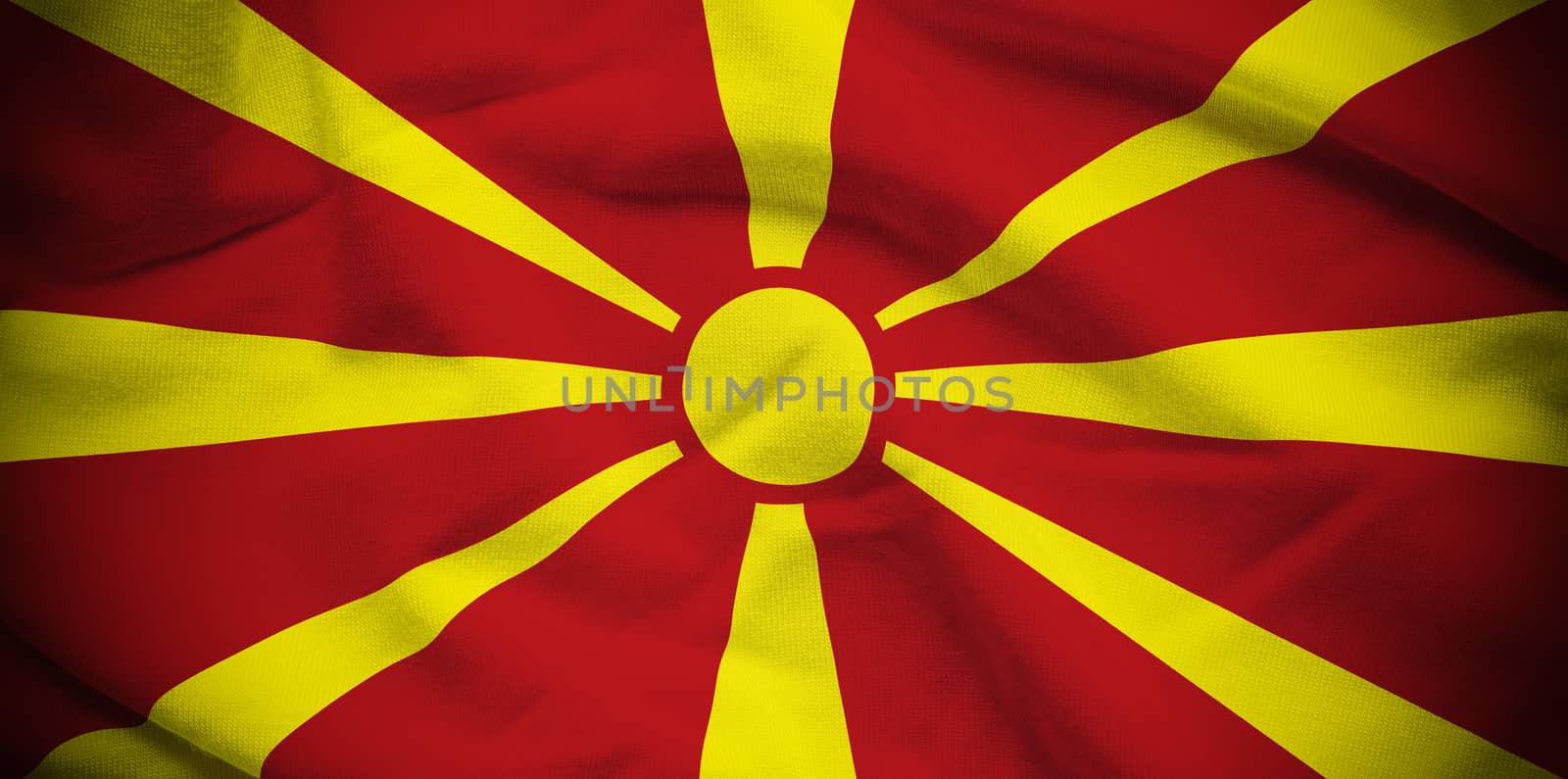 Wavy and rippled national flag of Macedonia background.