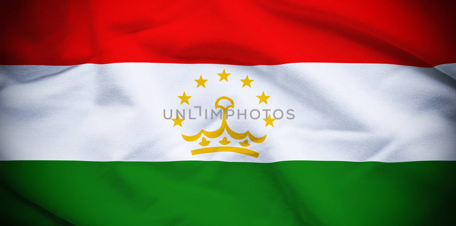 Wavy and rippled national flag of Tajikistan background.